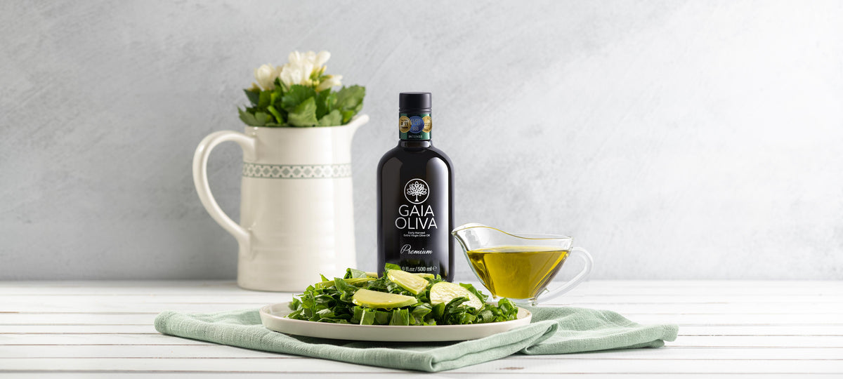 A healthy dish with salad and olive oil, illustrating how to choose and use olive oil in cooking.
