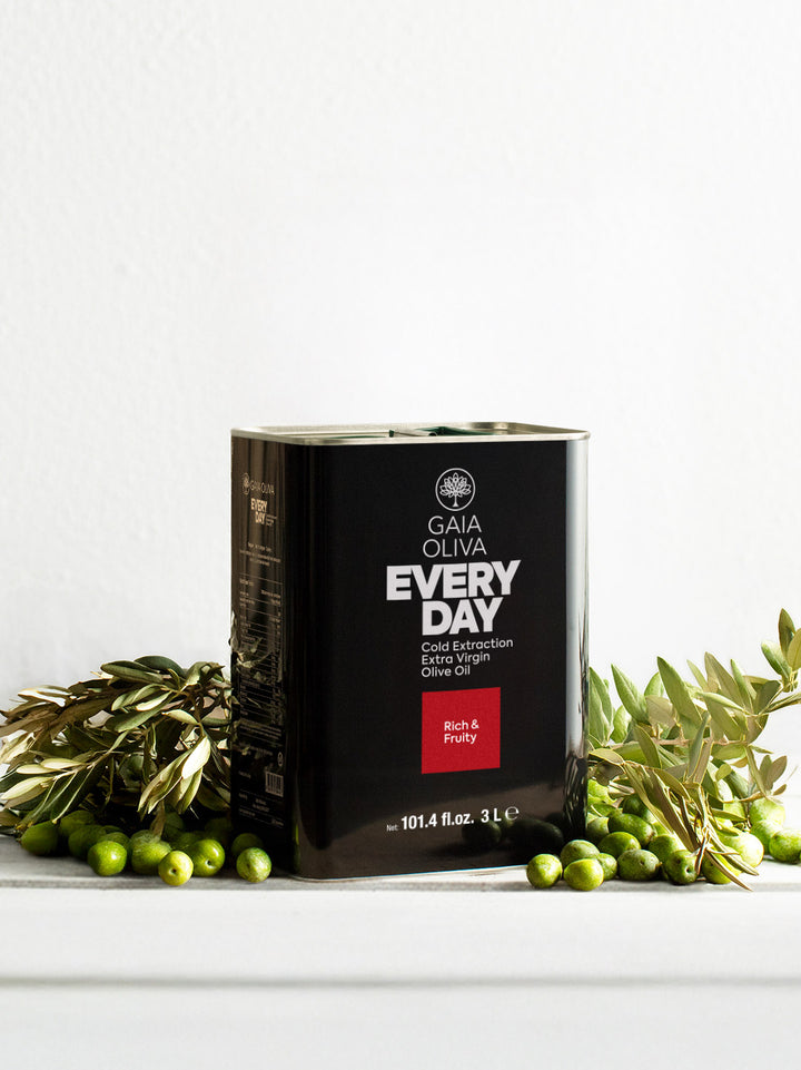 Everyday extra virgin olive oil 3L tin with olive branches on a white background