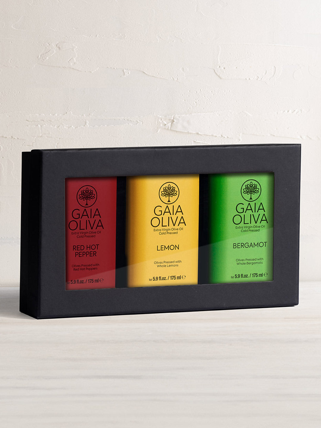 Extra Virgin Olive Oil Gift Set featuring Red Hot Pepper, Lemon, and Bergamot flavored oils in a stylish package.