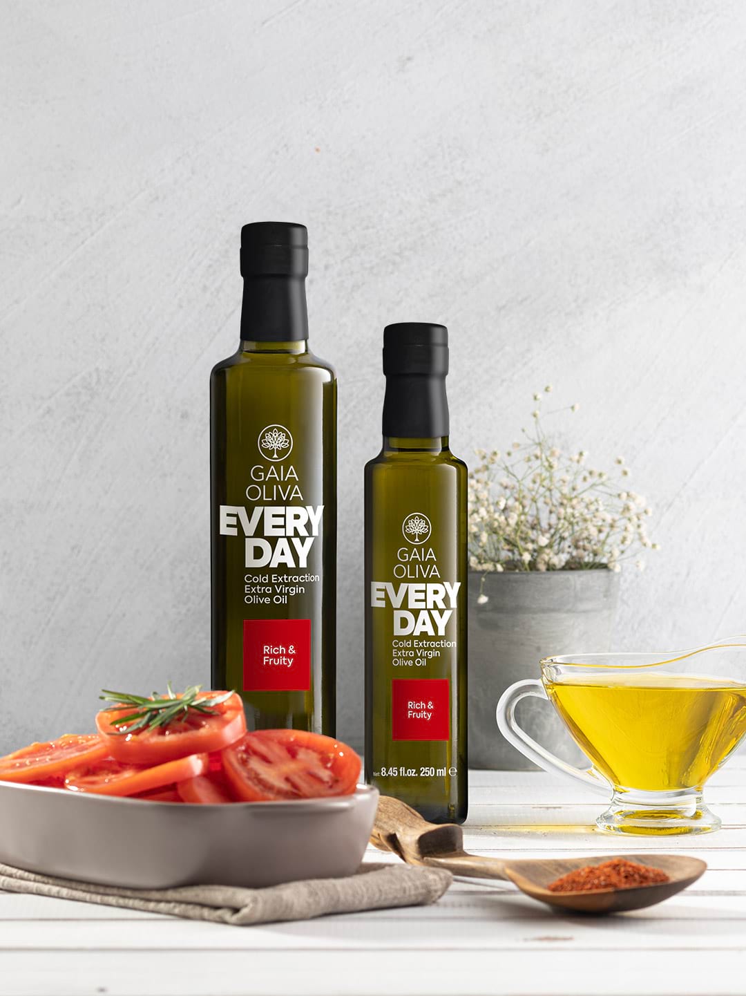 Everyday Extra Virgin Olive Oil with sliced tomatoes