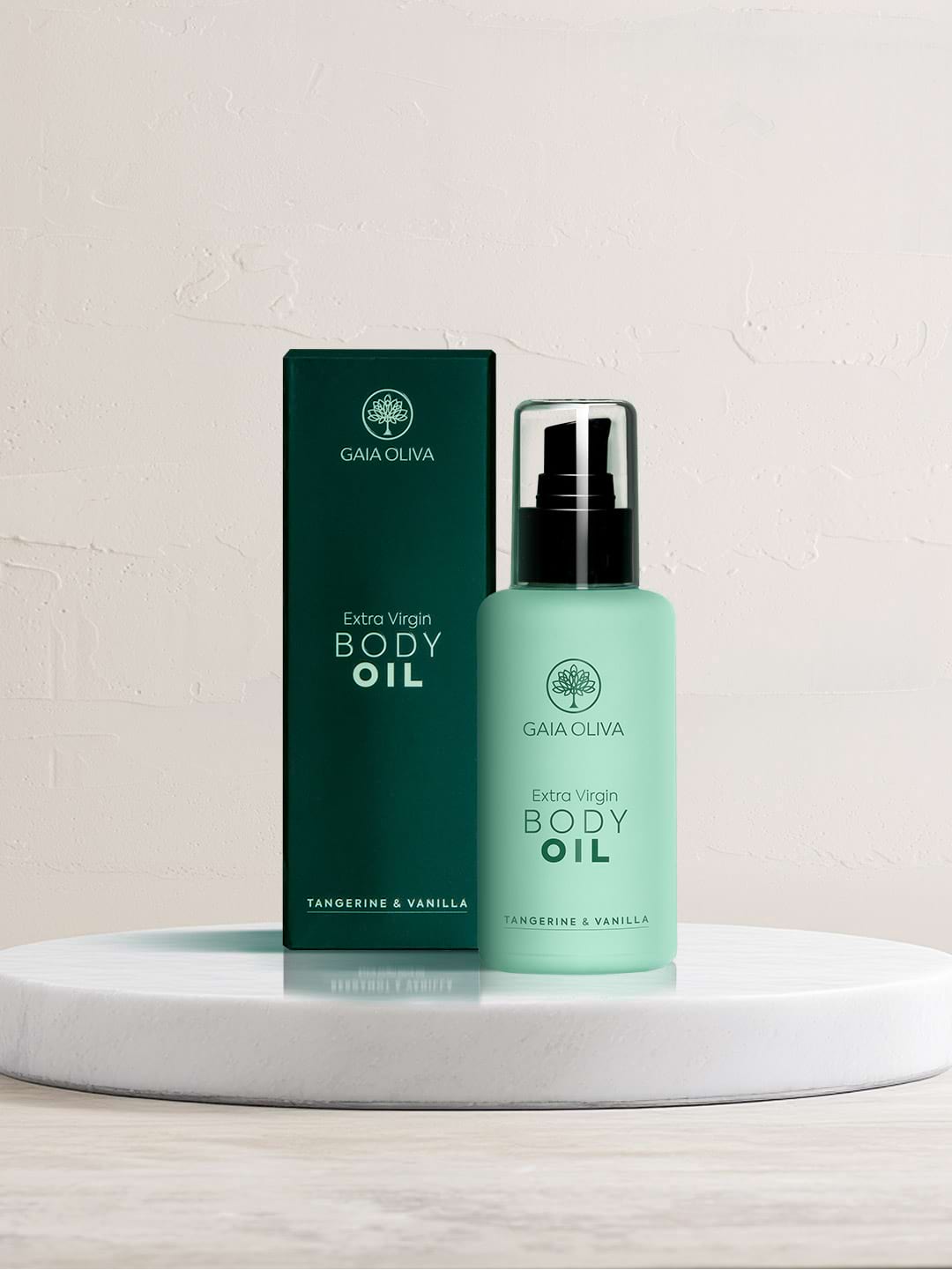 a bottle of Gaia Oliva  Extra Virgin Body Oil on marble surface