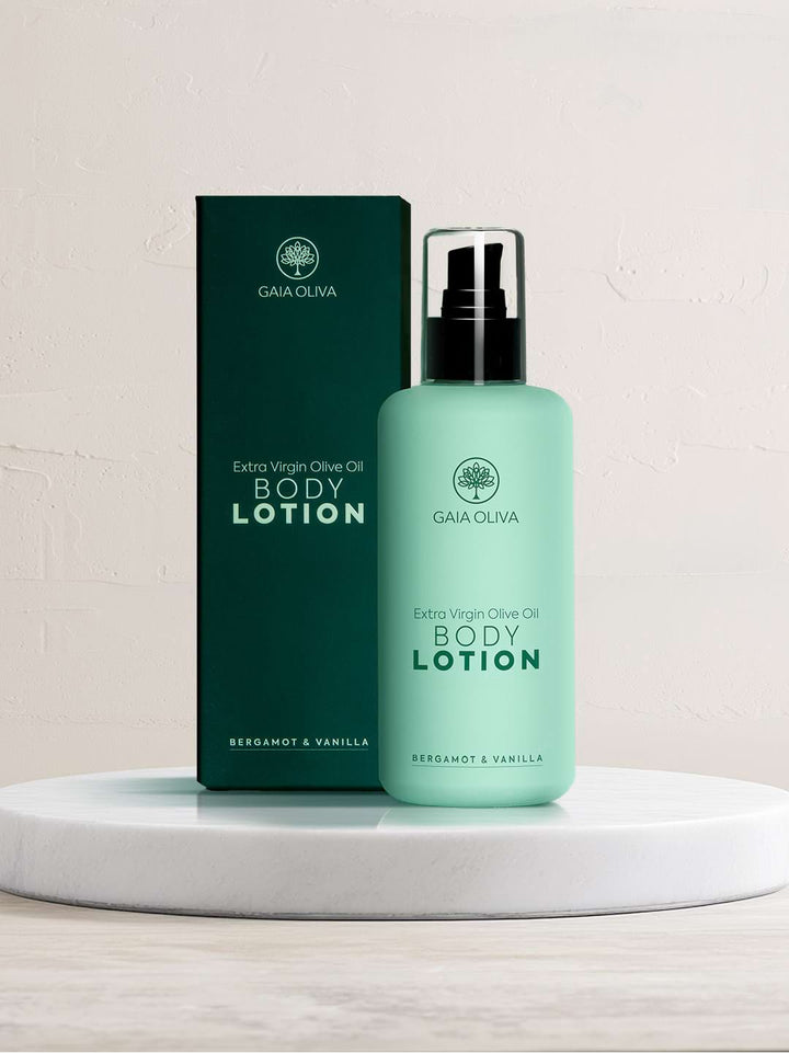 bottle of Gaia Oliva Olive Oil Body lotion on marble surface